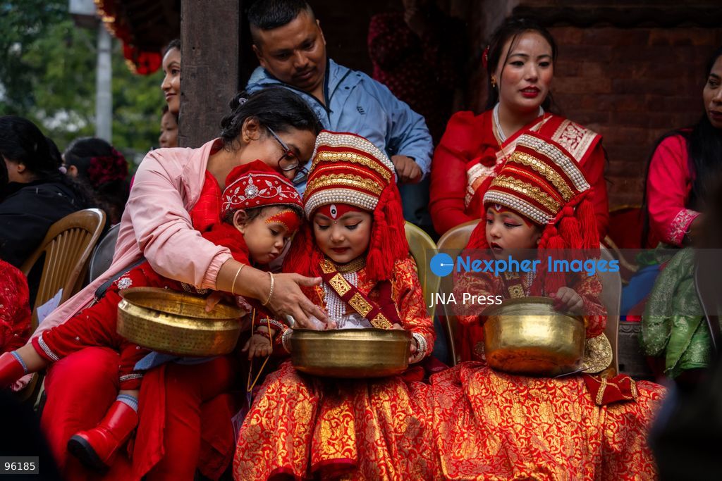 KATHMANDU, NEPAL, SEPTEMBER 24, 2026: Young girls dressed as Kumaris take part in a mass Kumari Puja at Hanuman Dhoka Durbar Square in Kathmandu on the second day of the Indra Jatra festival. Girls traditionally eligible for the ritual are worshipped as representations of the Kumari, or living goddess, during the ceremony. In Newar tradition, Kumari Puja is associated with prayers for peace, prosperity and well-being and with the blessings of Goddess Taleju Bhawani. Photo by Ghanashyam Shrestha / JNA Press. (Photo by Ghanashyam Shrestha/JNA Press via Nexpher Images)