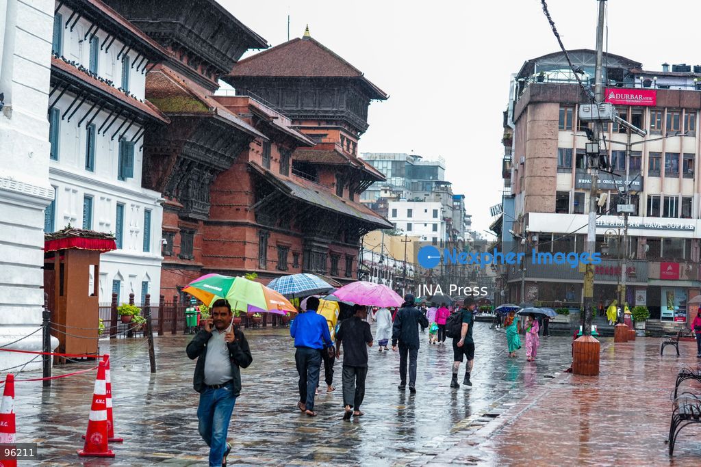 KATHMANDU, NEPAL, SEPTEMBER 24, 2026: People make their way through rainfall in Kathmandu as wet weather affects the Nepalese capital. Active monsoon conditions have brought increased cloud cover and rainfall across parts of Nepal. Photo by Ambir Tolang / JNA Press. (Photo by Ambir Tolang/JNA Press via Nexpher Images)