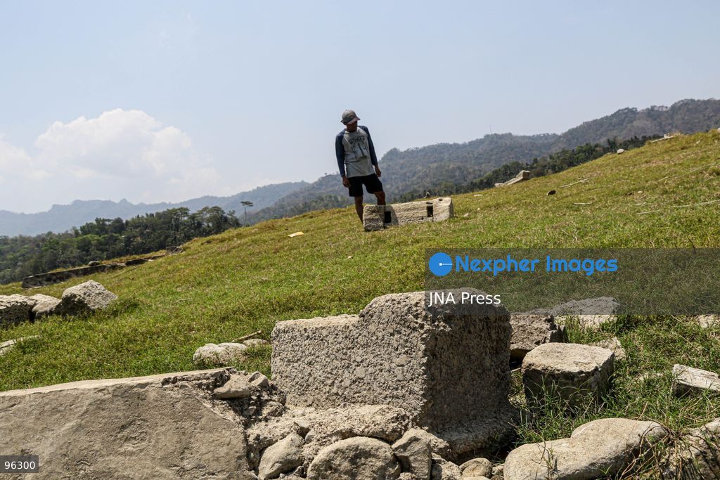 KULON PROGO, YOGYAKARTA, INDONESIA, SEPTEMBER 24, 2026: An old cemetery complex emerges as water levels recede at the Sermo Reservoir in Kulon Progo, Yogyakarta. The cemetery was among areas affected during construction of the reservoir between 1994 and 1996. Reservoir authorities said the lower water level has not disrupted operations or community water supplies, with the reservoir holding approximately 15 million cubic meters of water. Photo by Ilham Nur Arifin / JNA Press. (Photo by Ilham Nur Arifin/JNA Press via Nexpher Images)