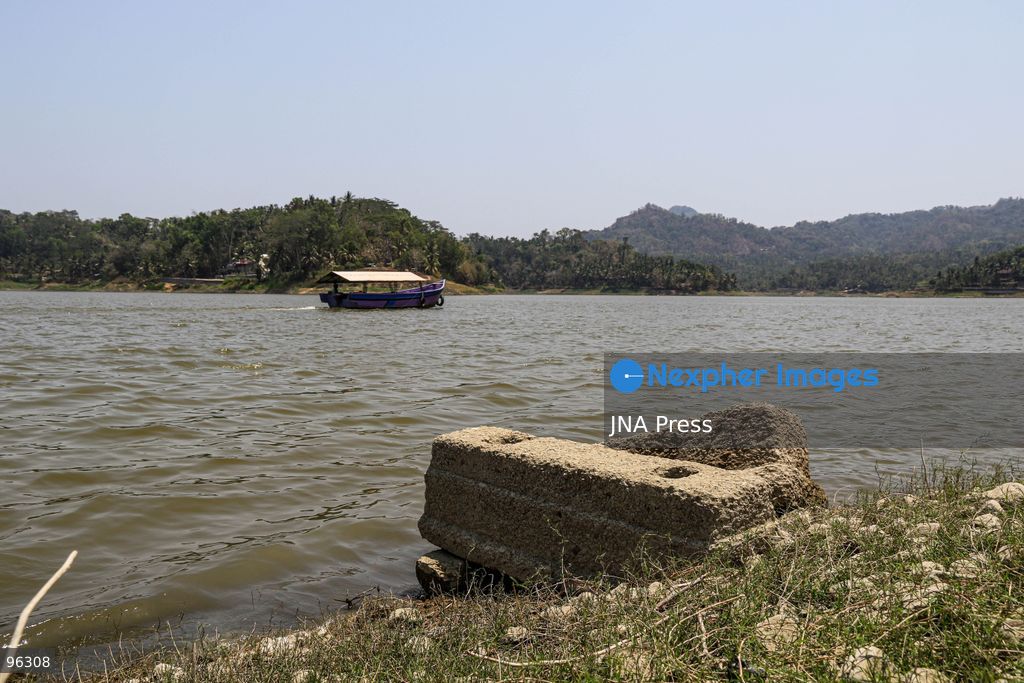 KULON PROGO, YOGYAKARTA, INDONESIA, SEPTEMBER 24, 2026: An old cemetery complex emerges as water levels recede at the Sermo Reservoir in Kulon Progo, Yogyakarta. The cemetery was among areas affected during construction of the reservoir between 1994 and 1996. Reservoir authorities said the lower water level has not disrupted operations or community water supplies, with the reservoir holding approximately 15 million cubic meters of water. Photo by Ilham Nur Arifin / JNA Press. (Photo by Ilham Nur Arifin/JNA Press via Nexpher Images)