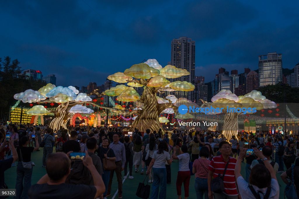 People viewing the mid autumn festival lights at Victoria Park on September 24, 2026 in Hong Kong. (Photo by Vernon Yuen/Nexpher Images)