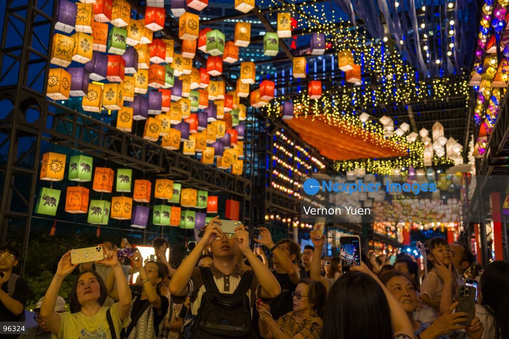 People viewing the mid autumn festival lights at Victoria Park on September 24, 2026 in Hong Kong. (Photo by Vernon Yuen/Nexpher Images)