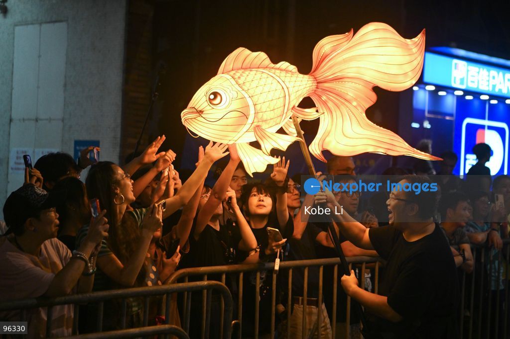 Visitors playing at Hong Kong Tai Hang on the eve of the Mid-autumn Festival on September 24, 2026 in Hong Kong. (Photo by Kobe Li/Nexpher Images)