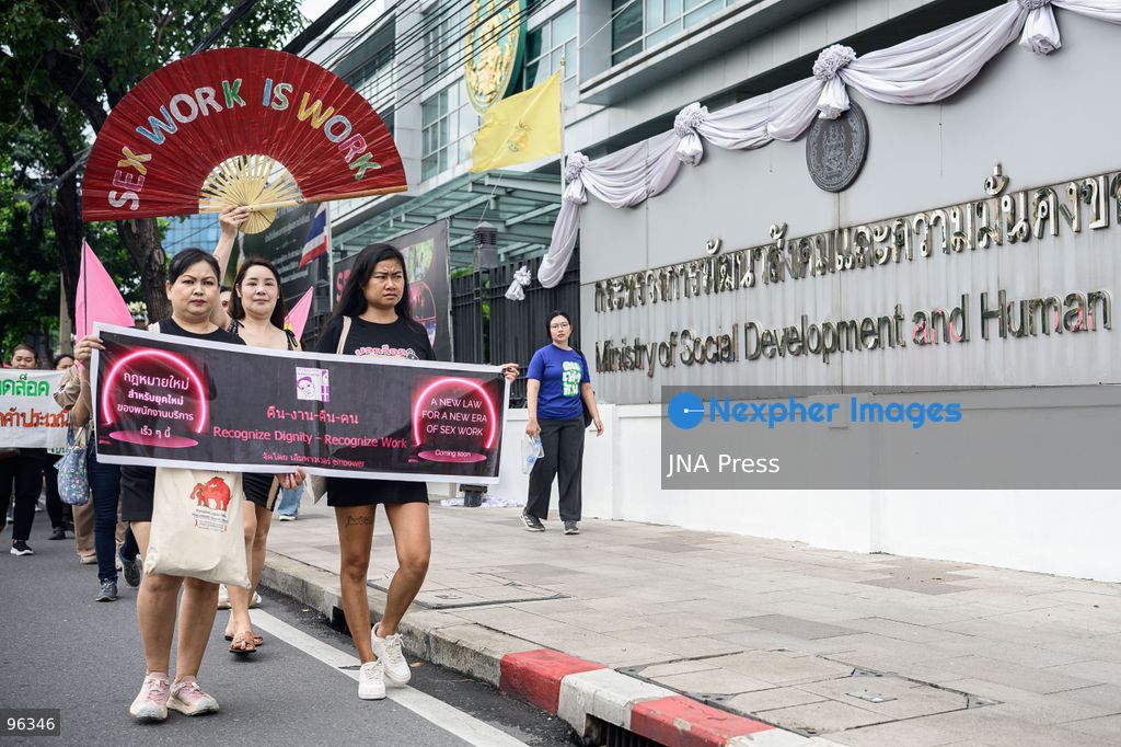 BANGKOK, THAILAND, SEPTEMBER 24, 2026: Sex workers’ rights activists demonstrate at the Ministry of Social Development and Human Security in Bangkok, calling for legislation to decriminalize sex work and provide labor protections. Thailand’s 1996 Prevention and Suppression of Prostitution Act criminalizes sex work, while rights groups are campaigning for legal recognition and access to labor and social protections. Photo by Watsawat Koktabtim / JNA Press. (Photo by Watsawat Koktabtim/JNA Press via Nexpher Images)