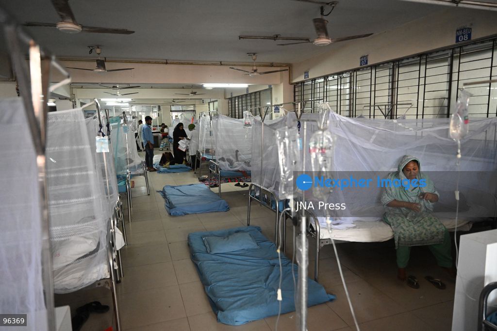 DHAKA, BANGLADESH, SEPTEMBER 24, 2026: Dengue patients receive treatment under mosquito nets at Sir Salimullah Medical College Mitford Hospital in Dhaka as Bangladesh experiences a sharp rise in infections. According to the Directorate General of Health Services, 69,149 dengue patients have been hospitalized nationwide since the beginning of 2026, with 209 deaths recorded as of September 24. Health authorities reported 1,782 new hospital admissions and eight deaths during the latest 24-hour reporting period. Photo by Mamuner Rashid/ JNA Press. (Photo by Mamunur Rashid/JNA Press via Nexpher Images)