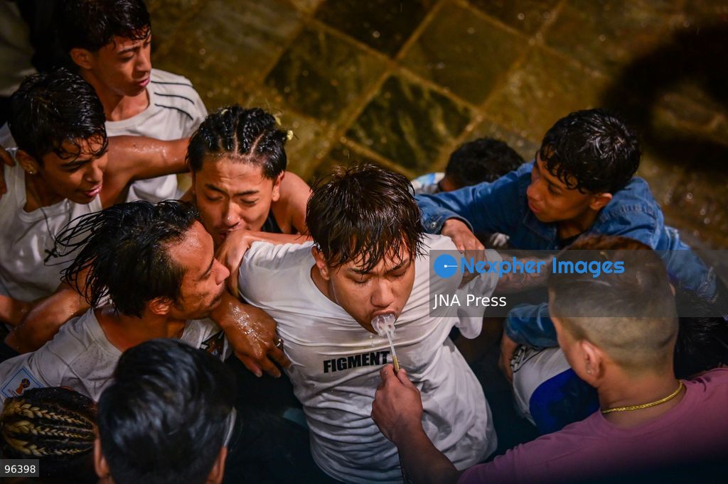KATHMANDU, NEPAL, SEPTEMBER 24, 2026: Revelers gather around the Swet Bhairab mask to receive rice beer flowing through a brass spout from the deity’s mouth during the second day of the Indra Jatra festival at Kathmandu Durbar Square. The drink is traditionally regarded as a blessing by devotees. Swet Bhairab, a representation of the Hindu deity Bhairava, is displayed publicly during the annual festival and remains covered for much of the rest of the year. Indra Jatra is an eight-day religious and cultural festival featuring processions, masked dances and traditional rituals in Kathmandu. Photo by Safal Prakash Shrestha / JNA Press. (Photo by Safal Prakash Shrestha/JNA Press via Nexpher Images)