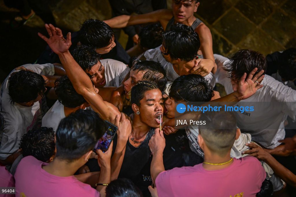 KATHMANDU, NEPAL, SEPTEMBER 24, 2026: Revelers gather around the Swet Bhairab mask to receive rice beer flowing through a brass spout from the deity’s mouth during the second day of the Indra Jatra festival at Kathmandu Durbar Square. The drink is traditionally regarded as a blessing by devotees. Swet Bhairab, a representation of the Hindu deity Bhairava, is displayed publicly during the annual festival and remains covered for much of the rest of the year. Indra Jatra is an eight-day religious and cultural festival featuring processions, masked dances and traditional rituals in Kathmandu. Photo by Safal Prakash Shrestha / JNA Press. (Photo by Safal Prakash Shrestha/JNA Press via Nexpher Images)