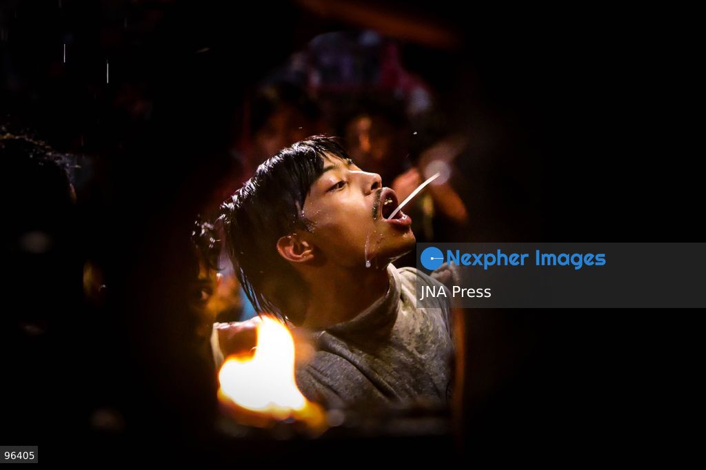 KATHMANDU, NEPAL, SEPTEMBER 24, 2026: Revelers gather around the Swet Bhairab mask to receive rice beer flowing through a brass spout from the deity’s mouth during the second day of the Indra Jatra festival at Kathmandu Durbar Square. The drink is traditionally regarded as a blessing by devotees. Swet Bhairab, a representation of the Hindu deity Bhairava, is displayed publicly during the annual festival and remains covered for much of the rest of the year. Indra Jatra is an eight-day religious and cultural festival featuring processions, masked dances and traditional rituals in Kathmandu. Photo by Safal Prakash Shrestha / JNA Press. (Photo by Safal Prakash Shrestha/JNA Press via Nexpher Images)