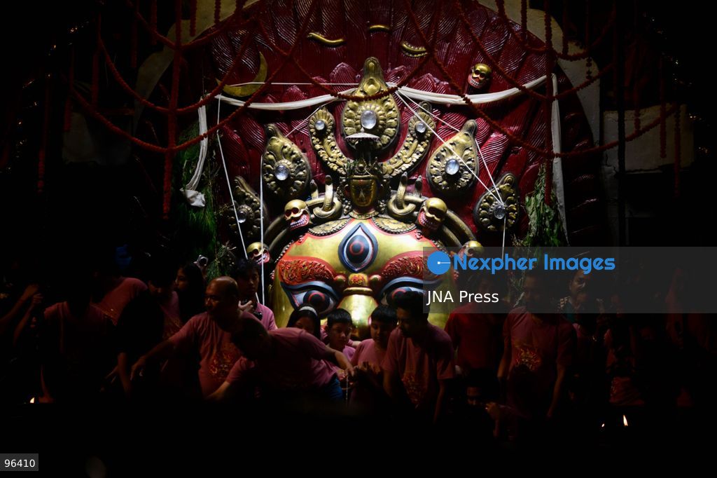 KATHMANDU, NEPAL, SEPTEMBER 24, 2026: Revelers gather around the Swet Bhairab mask to receive rice beer flowing through a brass spout from the deity’s mouth during the second day of the Indra Jatra festival at Kathmandu Durbar Square. The drink is traditionally regarded as a blessing by devotees. Swet Bhairab, a representation of the Hindu deity Bhairava, is displayed publicly during the annual festival and remains covered for much of the rest of the year. Indra Jatra is an eight-day religious and cultural festival featuring processions, masked dances and traditional rituals in Kathmandu. Photo by Safal Prakash Shrestha / JNA Press. (Photo by Safal Prakash Shrestha/JNA Press via Nexpher Images)