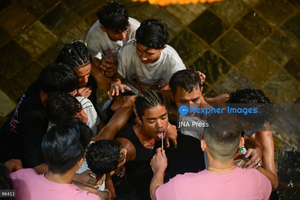 KATHMANDU, NEPAL, SEPTEMBER 24, 2026: Revelers gather around the Swet Bhairab mask to receive rice beer flowing through a brass spout from the deity’s mouth during the second day of the Indra Jatra festival at Kathmandu Durbar Square. The drink is traditionally regarded as a blessing by devotees. Swet Bhairab, a representation of the Hindu deity Bhairava, is displayed publicly during the annual festival and remains covered for much of the rest of the year. Indra Jatra is an eight-day religious and cultural festival featuring processions, masked dances and traditional rituals in Kathmandu. Photo by Safal Prakash Shrestha / JNA Press. (Photo by Safal Prakash Shrestha/JNA Press via Nexpher Images)