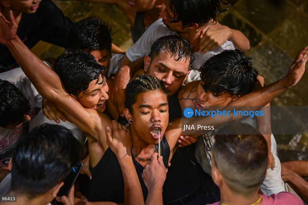 KATHMANDU, NEPAL, SEPTEMBER 24, 2026: Revelers gather around the Swet Bhairab mask to receive rice beer flowing through a brass spout from the deity’s mouth during the second day of the Indra Jatra festival at Kathmandu Durbar Square. The drink is traditionally regarded as a blessing by devotees. Swet Bhairab, a representation of the Hindu deity Bhairava, is displayed publicly during the annual festival and remains covered for much of the rest of the year. Indra Jatra is an eight-day religious and cultural festival featuring processions, masked dances and traditional rituals in Kathmandu. Photo by Safal Prakash Shrestha / JNA Press. (Photo by Safal Prakash Shrestha/JNA Press via Nexpher Images)