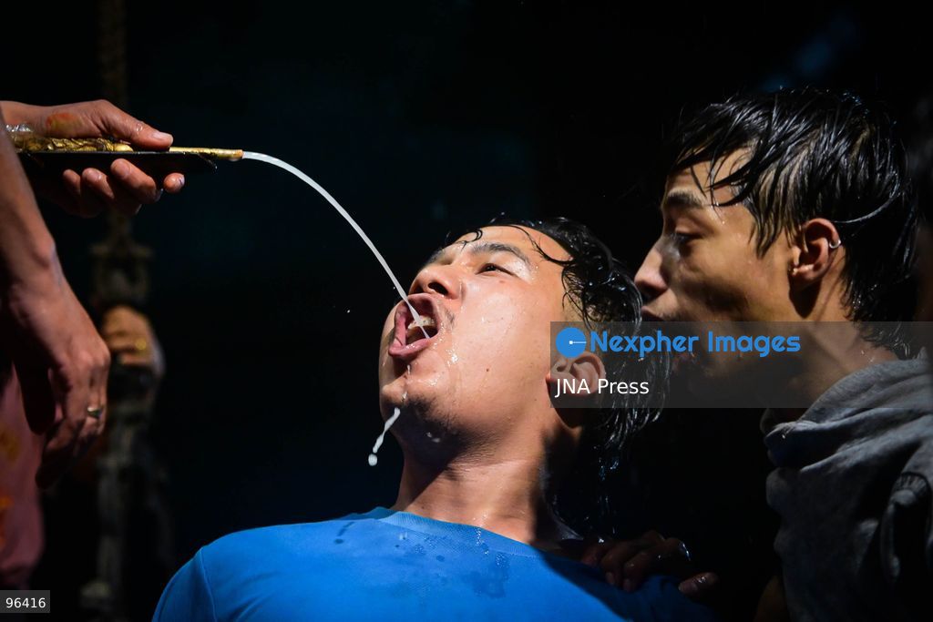 KATHMANDU, NEPAL, SEPTEMBER 24, 2026: Revelers gather around the Swet Bhairab mask to receive rice beer flowing through a brass spout from the deity’s mouth during the second day of the Indra Jatra festival at Kathmandu Durbar Square. The drink is traditionally regarded as a blessing by devotees. Swet Bhairab, a representation of the Hindu deity Bhairava, is displayed publicly during the annual festival and remains covered for much of the rest of the year. Indra Jatra is an eight-day religious and cultural festival featuring processions, masked dances and traditional rituals in Kathmandu. Photo by Safal Prakash Shrestha / JNA Press. (Photo by Safal Prakash Shrestha/JNA Press via Nexpher Images)