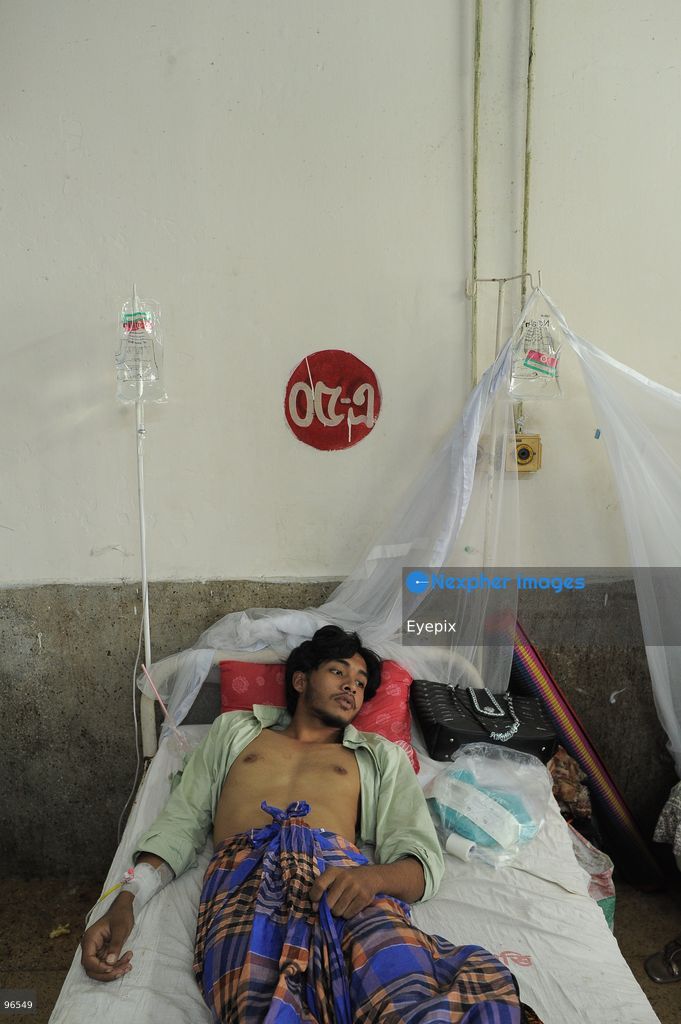 A patient receives treatment in the dengue ward at Chattogram Medical College Hospital (CMCH) amid a surge in cases across Bangladesh. According to hospital personnel, CMCH has admitted an average of 75 dengue patients daily over the past week, with many arriving from upazilas like Sitakunda, Karnaphuli, and Banshkhali after suffering from severe fever for three to eight days. (Photo by Md Rafayat Haque Khan/ Eyepix Group) (Photo by Md Rafayat Haque Khan/ Eyepix Group/Eyepix via Nexpher Images)