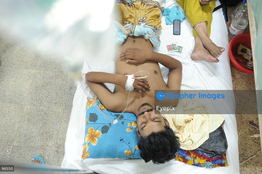 A patient receives treatment in the dengue ward at Chattogram Medical College Hospital (CMCH) amid a surge in cases across Bangladesh. According to hospital personnel, CMCH has admitted an average of 75 dengue patients daily over the past week, with many arriving from upazilas like Sitakunda, Karnaphuli, and Banshkhali after suffering from severe fever for three to eight days. (Photo by Md Rafayat Haque Khan/ Eyepix Group) (Photo by Md Rafayat Haque Khan/ Eyepix Group/Eyepix via Nexpher Images)