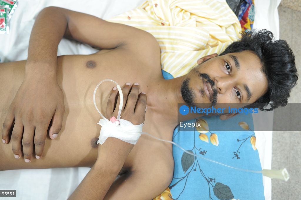 A patient receives treatment in the dengue ward at Chattogram Medical College Hospital (CMCH) amid a surge in cases across Bangladesh. According to hospital personnel, CMCH has admitted an average of 75 dengue patients daily over the past week, with many arriving from upazilas like Sitakunda, Karnaphuli, and Banshkhali after suffering from severe fever for three to eight days. (Photo by Md Rafayat Haque Khan/ Eyepix Group) (Photo by Md Rafayat Haque Khan/ Eyepix Group/Eyepix via Nexpher Images)