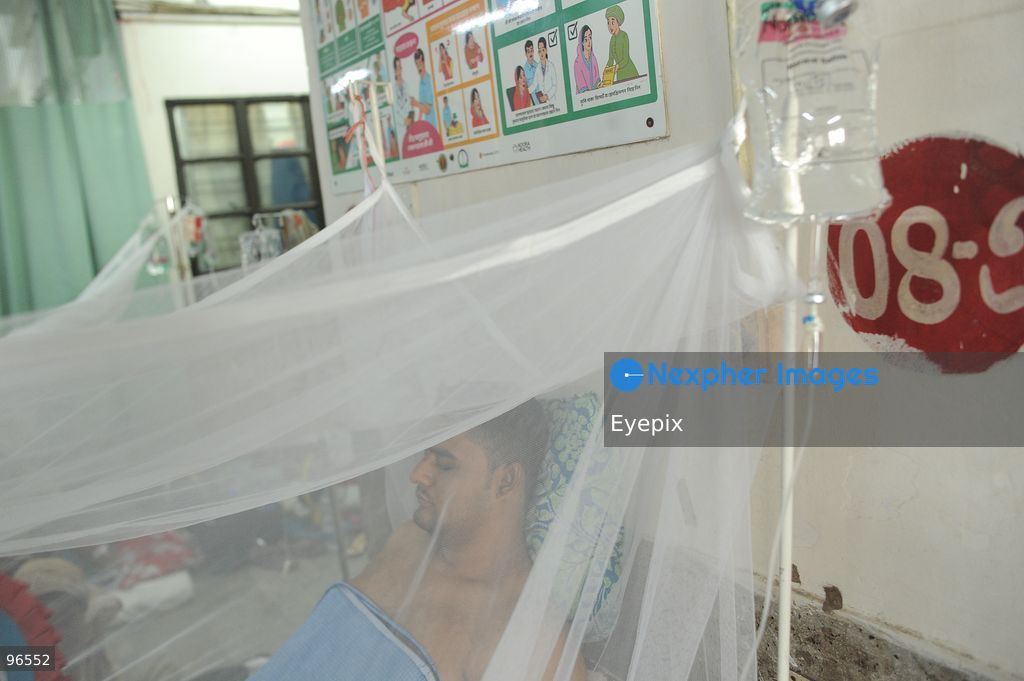 A patient receives treatment in the dengue ward at Chattogram Medical College Hospital (CMCH) amid a surge in cases across Bangladesh. According to hospital personnel, CMCH has admitted an average of 75 dengue patients daily over the past week, with many arriving from upazilas like Sitakunda, Karnaphuli, and Banshkhali after suffering from severe fever for three to eight days. (Photo by Md Rafayat Haque Khan/ Eyepix Group) (Photo by Md Rafayat Haque Khan/ Eyepix Group/Eyepix via Nexpher Images)