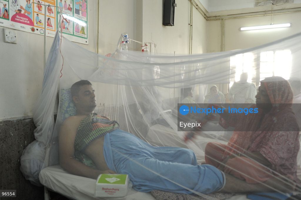 A patient receives treatment in the dengue ward at Chattogram Medical College Hospital (CMCH) amid a surge in cases across Bangladesh. According to hospital personnel, CMCH has admitted an average of 75 dengue patients daily over the past week, with many arriving from upazilas like Sitakunda, Karnaphuli, and Banshkhali after suffering from severe fever for three to eight days. (Photo by Md Rafayat Haque Khan/ Eyepix Group) (Photo by Md Rafayat Haque Khan/ Eyepix Group/Eyepix via Nexpher Images)