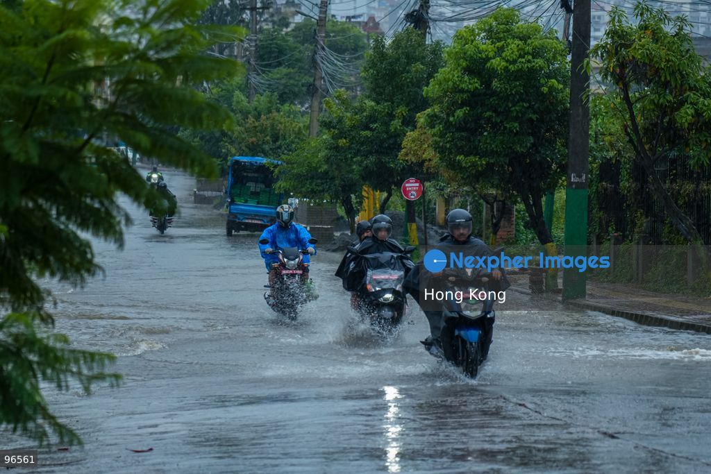 KATHMANDU, NEPAL —September 25, 2026: Heavy rainfall has caused water to overflow onto roads, disrupting the daily lives of residents and hindering vehicle movement in the Khumaltar area of Lalitpur, Nepal. The rainfall has disrupted daily activities as a deep depression over the Bay of Bengal continues to influence weather conditions in the region. (Photo by ap tolang/Nexpher Images)