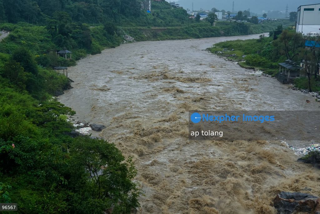 KATHMANDU, NEPAL —September 25, 2026: The water level in the Bagmati River rises amid heavy rainfall in Kathmandu, Nepal. The rainfall has disrupted daily activities as a deep depression over the Bay of Bengal continues to influence weather conditions in the region. (Photo by ap tolang/Nexpher Images)