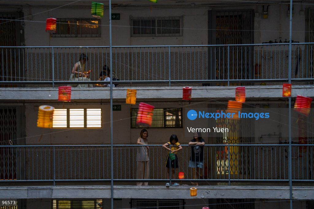 Residents handing Lanterns from a balcony at a housing estate on September 25, 2026 in Hong Kong. (Photo by Vernon Yuen/Nexpher Images)