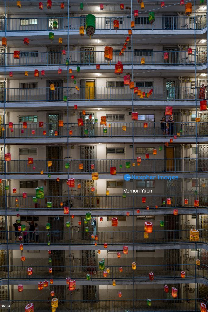 Lanterns hanging from a balcony at a housing estate on September 25, 2026 in Hong Kong. (Photo by Vernon Yuen/Nexpher Images)