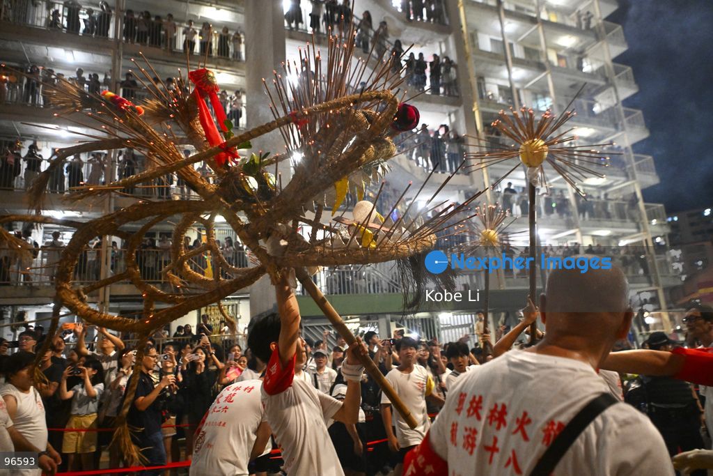 Performers performing the fire dragon dance at Wah Fu Estate at Mid-autumn Festival on September 25, 2026 in Hong Kong. (Photo by Kobe Li/Nexpher Images)