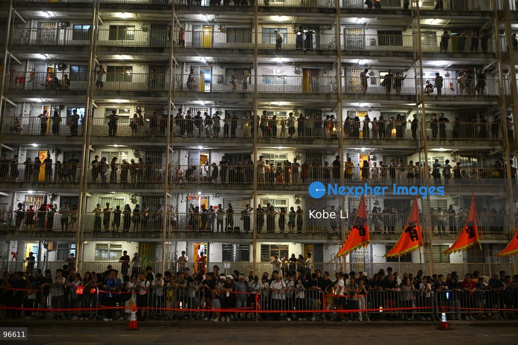 People waiting the fire dragon dance in Wah Fu Estate at Mid-autumn Festival on September 25, 2026 in Hong Kong. (Photo by Kobe Li/Nexpher Images)