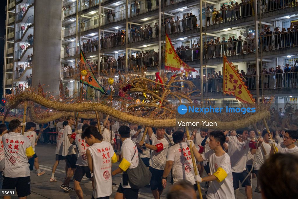 Performers performing the fire dragon dance at Wah Fu Estate on September 25, 2026 in Hong Kong. (Photo by Vernon Yuen/Nexpher Images)