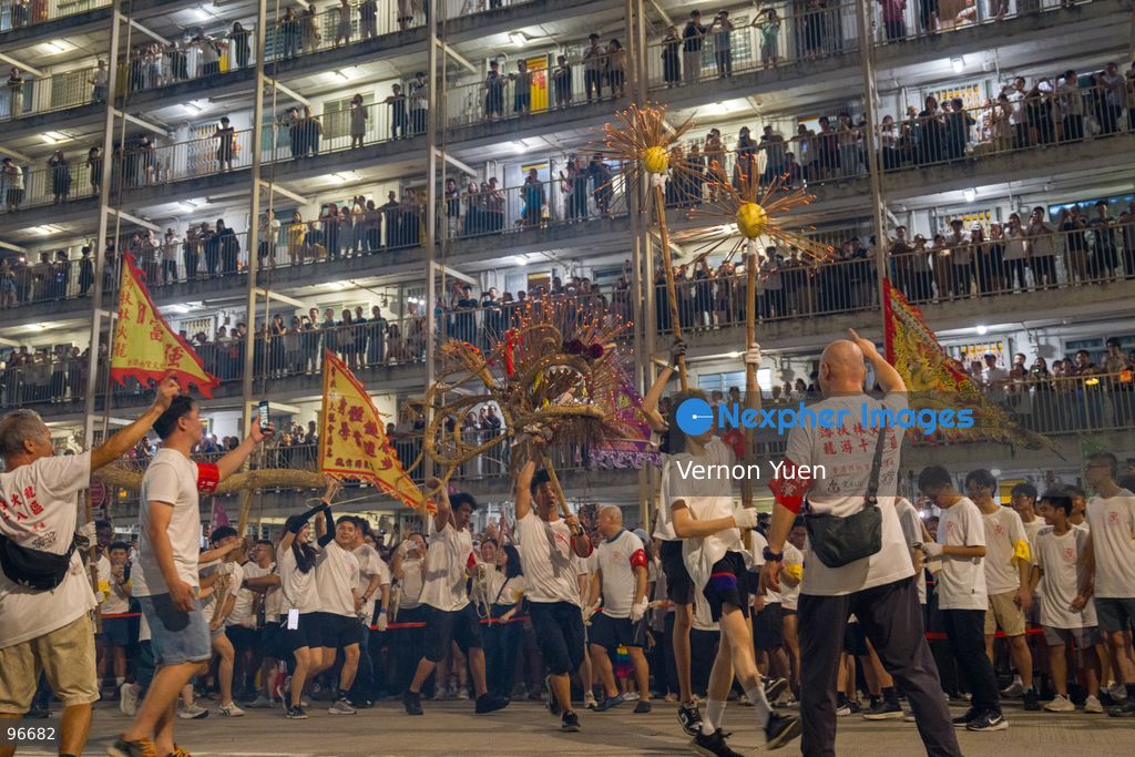 Performers performing the fire dragon dance at Wah Fu Estate on September 25, 2026 in Hong Kong. (Photo by Vernon Yuen/Nexpher Images)