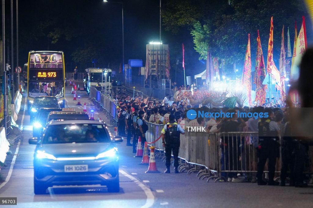 Villagers parade the 30-metre-long fire dragon, glowing with thousands of burning incense sticks, through the narrow alleys of Pok Fu Lam Village on September 25, 2026 in Hong Kong. The century-old Mid-Autumn Festival tradition kicks off with blessings inside the historical indigenous settlement before making its journey across the Southern District. (Photo by Zulu Lo/TMHK via Nexpher Images)
