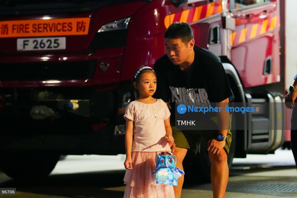 Participants perform the traditional fire dragon dance along Pok Fu Lam Road outside the Pok Fu Lam Fire Station on September 25, 2026 in Hong Kong, bringing vibrant festive cheers and Mid-Autumn blessings to local emergency personnel and onlooking crowds. (Photo by Zulu Lo/TMHK via Nexpher Images)