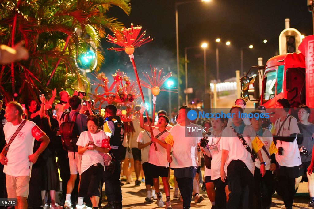 Participants perform the traditional fire dragon dance along Pok Fu Lam Road outside the Pok Fu Lam Fire Station on September 25, 2026 in Hong Kong, bringing vibrant festive cheers and Mid-Autumn blessings to local emergency personnel and onlooking crowds. (Photo by Zulu Lo/TMHK via Nexpher Images)