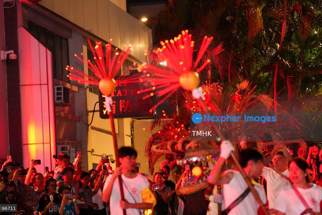 Participants perform the traditional fire dragon dance along Pok Fu Lam Road outside the Pok Fu Lam Fire Station on September 25, 2026 in Hong Kong, bringing vibrant festive cheers and Mid-Autumn blessings to local emergency personnel and onlooking crowds. (Photo by Zulu Lo/TMHK via Nexpher Images)