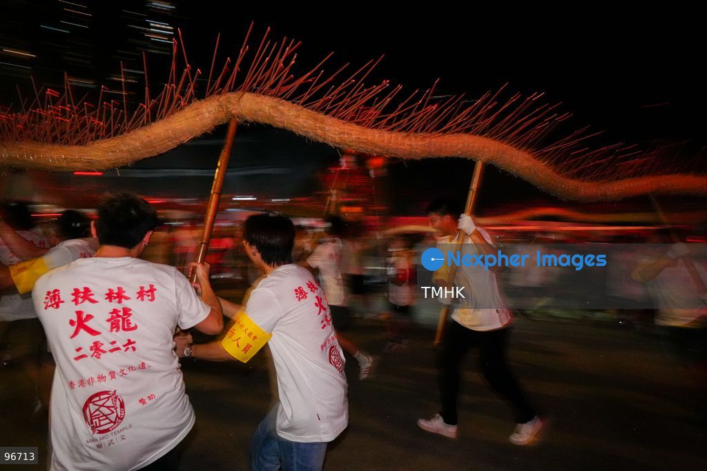 Participants perform the traditional fire dragon dance along Pok Fu Lam Road outside the Pok Fu Lam Fire Station on September 25, 2026 in Hong Kong, bringing vibrant festive cheers and Mid-Autumn blessings to local emergency personnel and onlooking crowds. (Photo by Zulu Lo/TMHK via Nexpher Images)