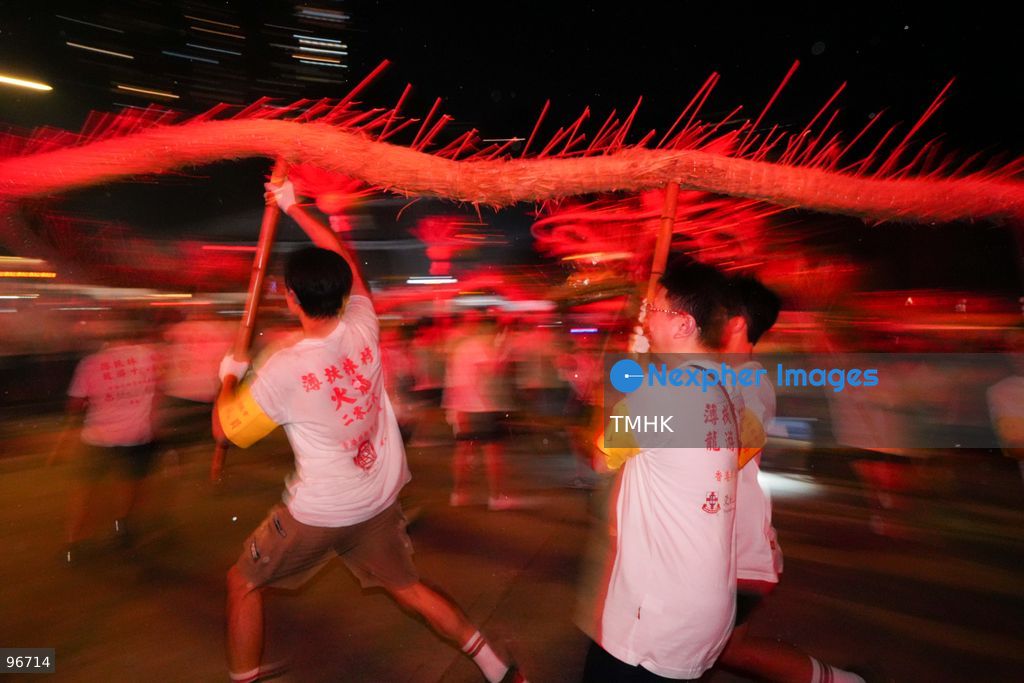 Participants perform the traditional fire dragon dance along Pok Fu Lam Road outside the Pok Fu Lam Fire Station on September 25, 2026 in Hong Kong, bringing vibrant festive cheers and Mid-Autumn blessings to local emergency personnel and onlooking crowds. (Photo by Zulu Lo/TMHK via Nexpher Images)