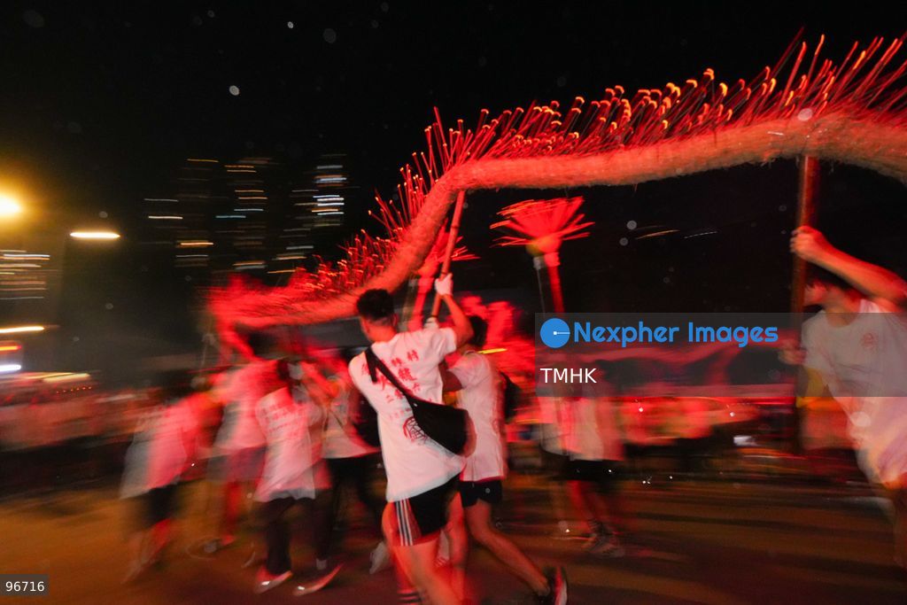 Participants perform the traditional fire dragon dance along Pok Fu Lam Road outside the Pok Fu Lam Fire Station on September 25, 2026 in Hong Kong, bringing vibrant festive cheers and Mid-Autumn blessings to local emergency personnel and onlooking crowds. (Photo by Zulu Lo/TMHK via Nexpher Images)