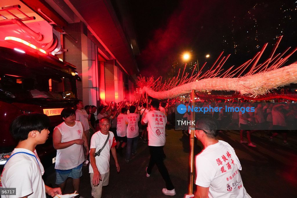 Participants perform the traditional fire dragon dance along Pok Fu Lam Road outside the Pok Fu Lam Fire Station on September 25, 2026 in Hong Kong, bringing vibrant festive cheers and Mid-Autumn blessings to local emergency personnel and onlooking crowds. (Photo by Zulu Lo/TMHK via Nexpher Images)