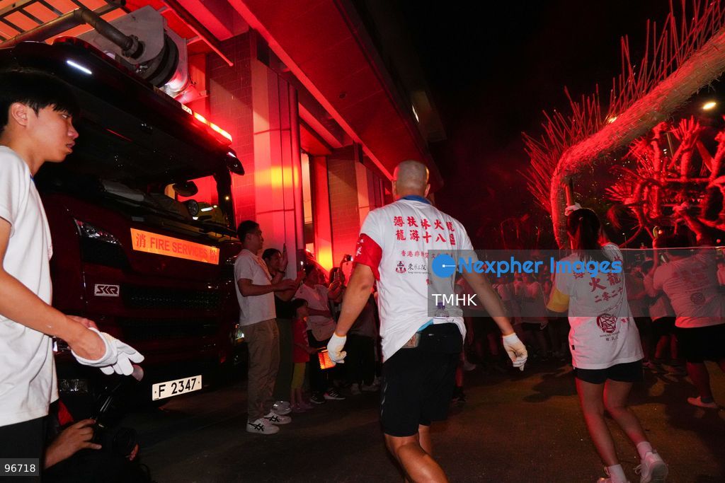 Participants perform the traditional fire dragon dance along Pok Fu Lam Road outside the Pok Fu Lam Fire Station on September 25, 2026 in Hong Kong, bringing vibrant festive cheers and Mid-Autumn blessings to local emergency personnel and onlooking crowds. (Photo by Zulu Lo/TMHK via Nexpher Images)