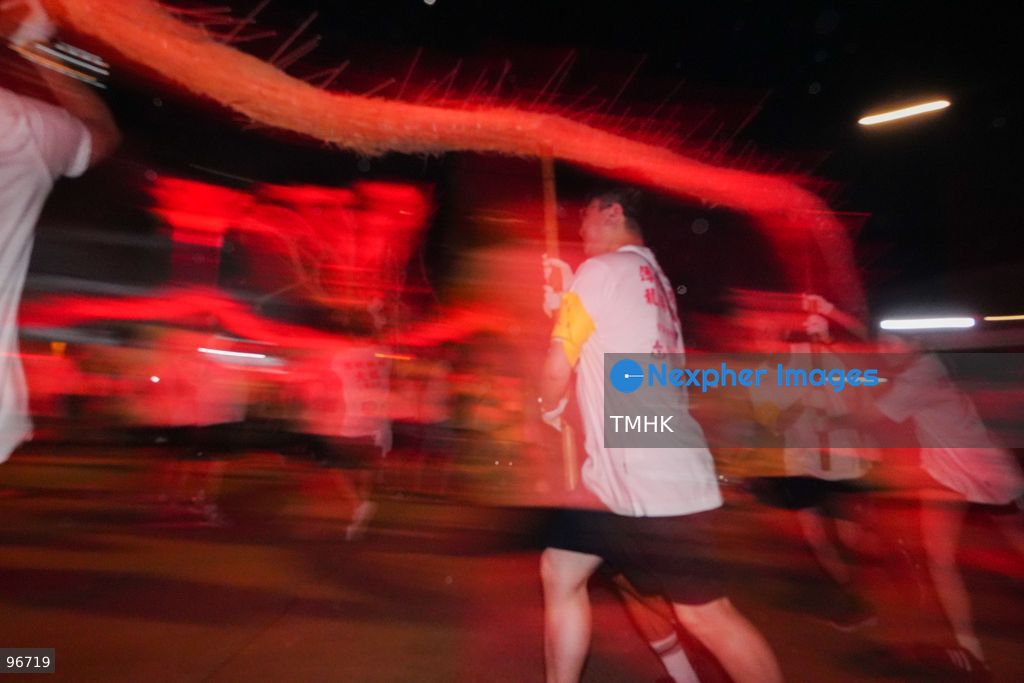 Participants perform the traditional fire dragon dance along Pok Fu Lam Road outside the Pok Fu Lam Fire Station on September 25, 2026 in Hong Kong, bringing vibrant festive cheers and Mid-Autumn blessings to local emergency personnel and onlooking crowds. (Photo by Zulu Lo/TMHK via Nexpher Images)