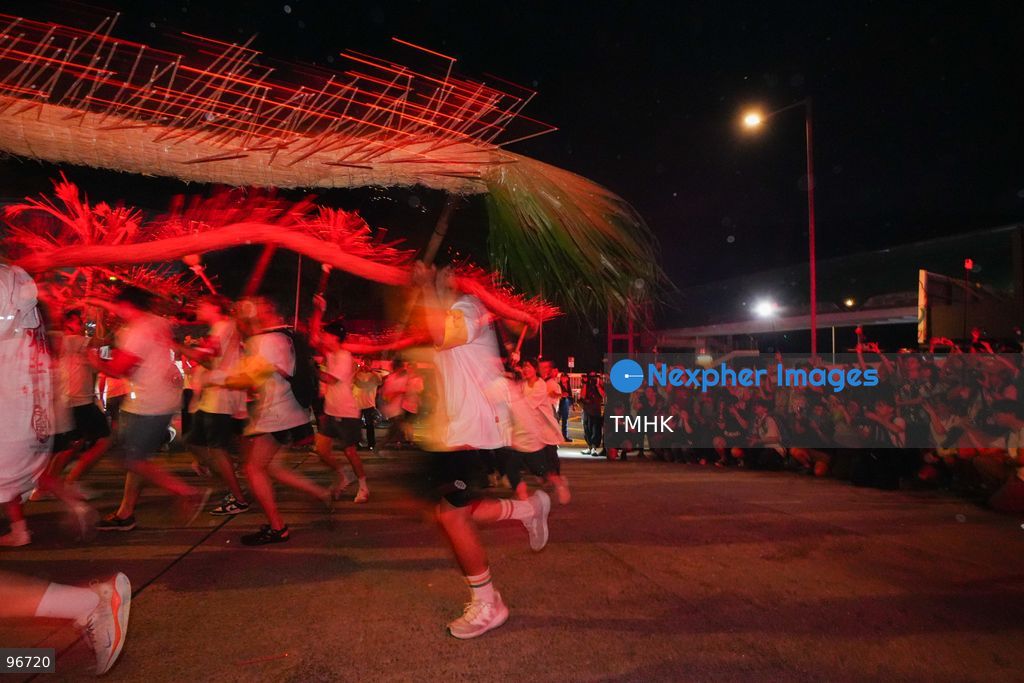Participants perform the traditional fire dragon dance along Pok Fu Lam Road outside the Pok Fu Lam Fire Station on September 25, 2026 in Hong Kong, bringing vibrant festive cheers and Mid-Autumn blessings to local emergency personnel and onlooking crowds. (Photo by Zulu Lo/TMHK via Nexpher Images)