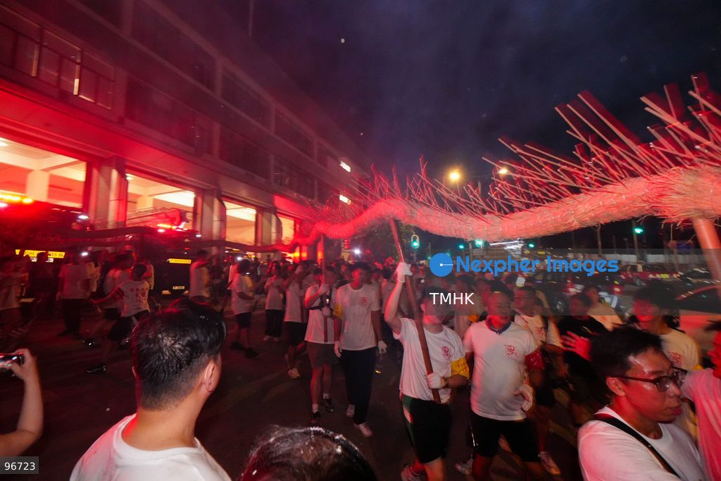 Participants perform the traditional fire dragon dance along Pok Fu Lam Road outside the Pok Fu Lam Fire Station on September 25, 2026 in Hong Kong, bringing vibrant festive cheers and Mid-Autumn blessings to local emergency personnel and onlooking crowds. (Photo by Zulu Lo/TMHK via Nexpher Images)