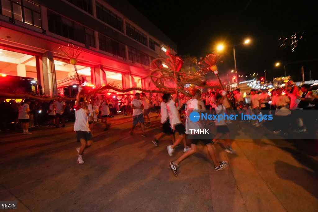 Participants perform the traditional fire dragon dance along Pok Fu Lam Road outside the Pok Fu Lam Fire Station on September 25, 2026 in Hong Kong, bringing vibrant festive cheers and Mid-Autumn blessings to local emergency personnel and onlooking crowds. (Photo by Zulu Lo/TMHK via Nexpher Images)