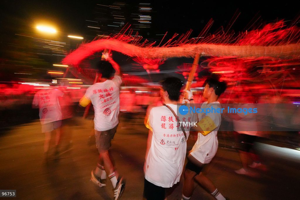 Participants perform the traditional fire dragon dance along Pok Fu Lam Road outside the Pok Fu Lam Fire Station on September 25, 2026 in Hong Kong, bringing vibrant festive cheers and Mid-Autumn blessings to local emergency personnel and onlooking crowds. (Photo by Zulu Lo/TMHK via Nexpher Images)