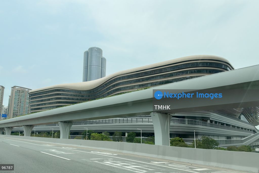 A general view captured from the G4 Beijing-Hong Kong-Macau Expressway shows the construction and exterior facade of the new Huanggang Port passenger clearance building on September 22, 2026 in Shenzhen, Guangdong Province, China. The upgraded mega-checkpoint aims to enhance cross-boundary connectivity and clearance capacity within the Guangdong-Hong Kong-Macao Greater Bay Area. (Photo by Kevin Li/TMHK via Nexpher Images)