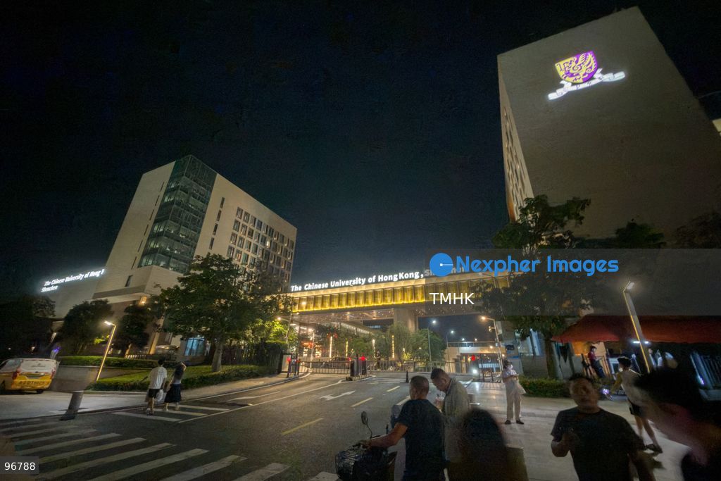 An evening general view shows the illuminated main entrance gate and signage of The Chinese University of Hong Kong, Shenzhen (CUHK-Shenzhen) campus in Longgang District on September 25, 2026 in Shenzhen, Guangdong Province, China. (Photo by Kevin Li/TMHK via Nexpher Images)