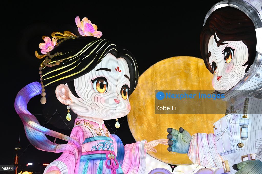 Large illuminated figures depicting a traditional Hanfu and an astronaut are displayed during a nighttime event in Hung Hom New Waterfront, the day after the Mid-Autumn Festival on September 26, 2026 in Hong Kong. (Photo by Kobe Li/Nexpher Images)