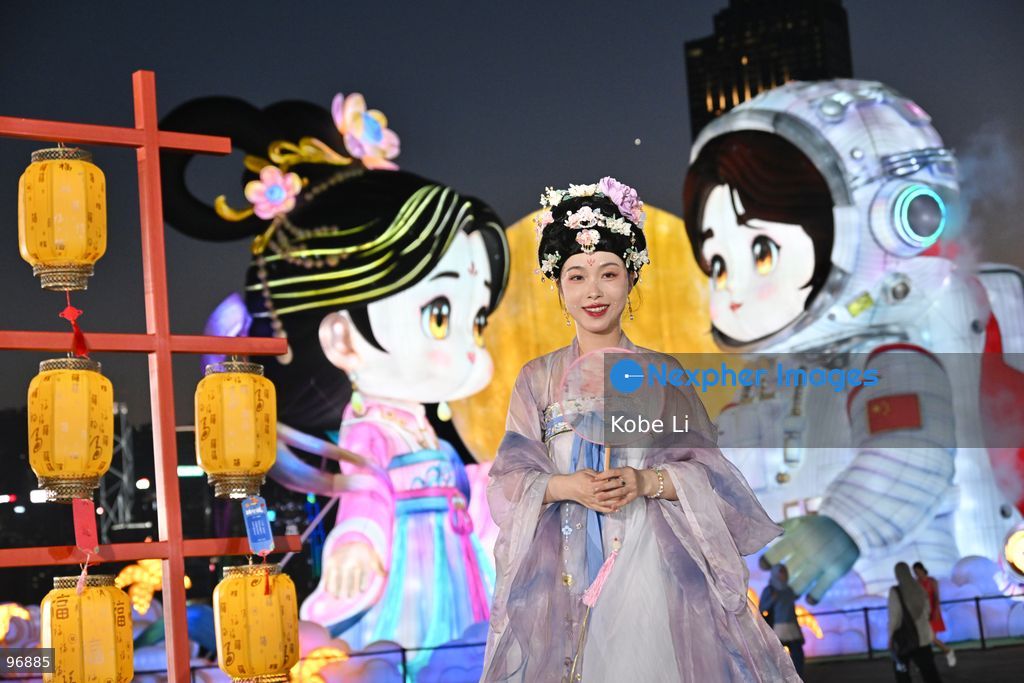 A performer in traditional Hanfu attire posing photo in Hung Hom New Waterfront the day after the Mid-Autumn Festival on September 26, 2026 in Hong Kong. (Photo by Kobe Li/Nexpher Images)