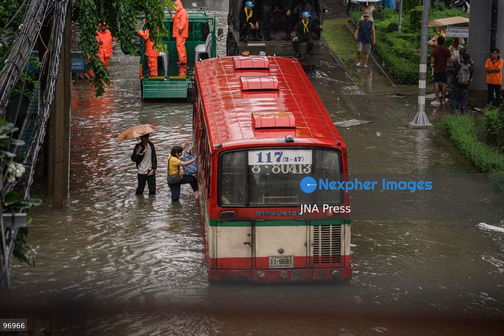 BANGKOK, THAILAND, SEPTEMBER 26, 2026: Residents navigate flooded streets amid persistent heavy rain in Bangkok, Thailand. Continuous rainfall since September 24 caused widespread flooding across the capital, with nearly 300 millimeters of rain recorded in some areas. Bangkok authorities declared all 50 districts disaster-affected as floodwaters disrupted roads and residential communities. More heavy rain was forecast through September 27. Photo by Watsawat Koktabtim (Photo by Watsawat Koktabtim/JNA Press via Nexpher Images)