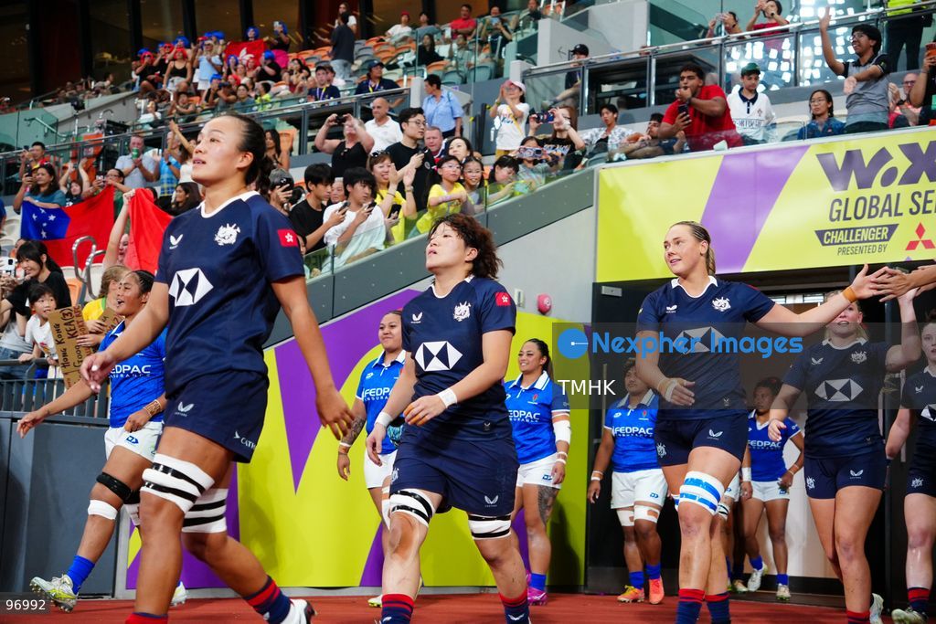Players of Hong Kong, China and Samoa walk out of the tunnel and onto the pitch ahead of their WXV 3 global rugby tournament clash at Kai Tak Youth Sports Ground on September 26, 2026 in Hong Kong. The round three match commenced following a five-hour delay enforced under extreme heat safety guidelines, which also caused the cancellation of the subsequent fixture between Spain and Brazil. (Photo by Zulu Lo/TMHK via Nexpher Images)
