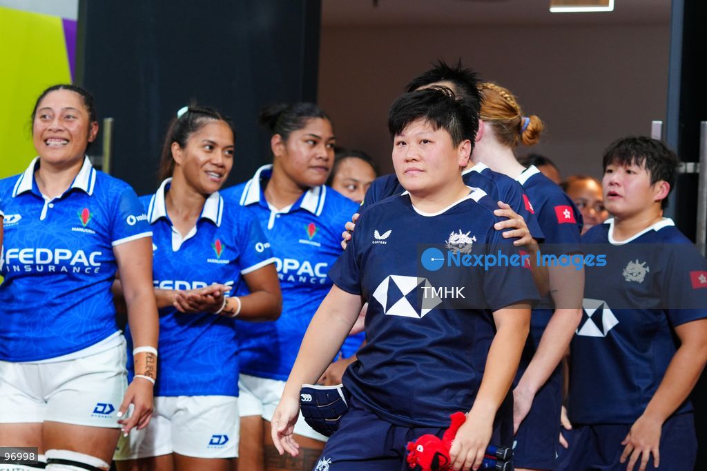 Players of Hong Kong, China and Samoa walk out of the tunnel and onto the pitch ahead of their WXV 3 global rugby tournament clash at Kai Tak Youth Sports Ground on September 26, 2026 in Hong Kong. The round three match commenced following a five-hour delay enforced under extreme heat safety guidelines, which also caused the cancellation of the subsequent fixture between Spain and Brazil. (Photo by Zulu Lo/TMHK via Nexpher Images)